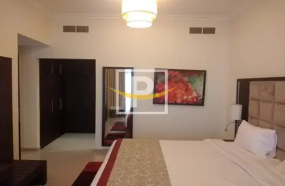 Room / Bedroom image for: Apartment - 2 Bedrooms - 2 Bathrooms for sale in Siraj Tower - Arjan - Dubai, Image 1