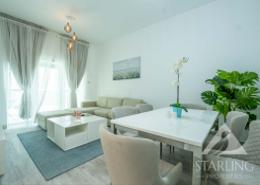 Living / Dining Room image for: Apartment - 1 bedroom - 1 bathroom for sale in Marina Pinnacle - Dubai Marina - Dubai, Image 1