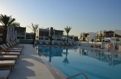 Pool image for: Townhouse - 4 Bedrooms - 5 Bathrooms for sale in Aurum Villas - Claret - Damac Hills 2 - Dubai, Image 1