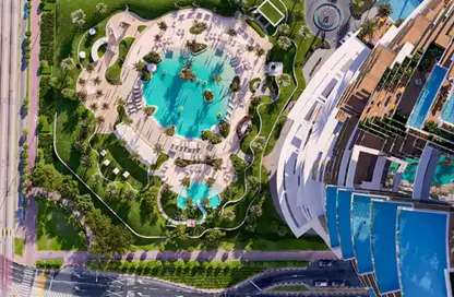 Pool image for: Apartment - 2 Bedrooms - 4 Bathrooms for sale in Cavalli Casa Tower - Al Sufouh 2 - Al Sufouh - Dubai, Image 1