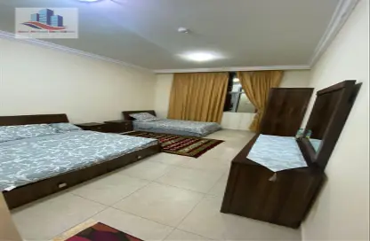 Room / Bedroom image for: Apartment - 1 Bedroom - 2 Bathrooms for rent in Al Taawun - Sharjah, Image 1