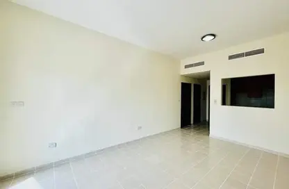 Empty Room image for: Apartment - 1 Bedroom - 2 Bathrooms for rent in The Gardens - Dubai, Image 1