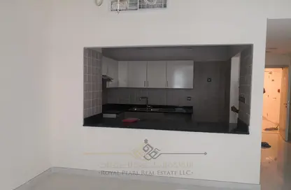 Kitchen image for: Apartment - 1 Bedroom - 2 Bathrooms for sale in The Polo Residence - Meydan Avenue - Meydan - Dubai, Image 1