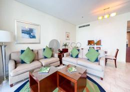 Living Room image for: Apartment - 3 bedrooms - 4 bathrooms for rent in Blue Beach Tower - Jumeirah Beach Residence - Dubai, Image 1