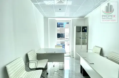 Office image for: Office Space - Studio - 1 Bathroom for rent in Latifa Tower - Sheikh Zayed Road - Dubai, Image 1