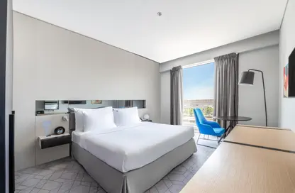 صورة لـ غرفة- غرفة النوم النزل و الشقق الفندقية - 2 غرف نوم - 3 حمامات للايجار في المنطقة الحرة بالمطار - منطقة مطار دبي الدولي - ديرة - دبي ، صورة رقم 1