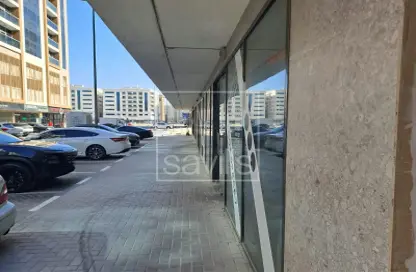 محل - استوديو للايجار في مبني آمان - تجارية مويلح - الشارقة
