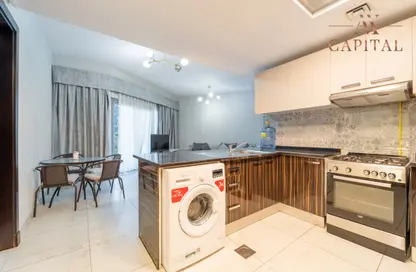 Kitchen image for: Apartment - 1 Bedroom - 1 Bathroom for sale in MAG 550 - Mag 5 Boulevard - Dubai South (Dubai World Central) - Dubai, Image 1