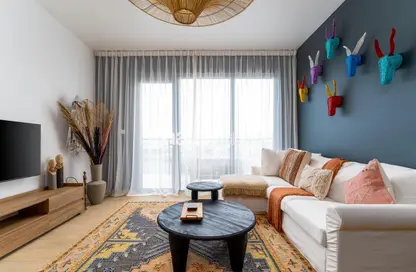 Living Room image for: Apartment - 1 Bedroom - 1 Bathroom for rent in La Cote - La Mer - Jumeirah - Dubai, Image 1