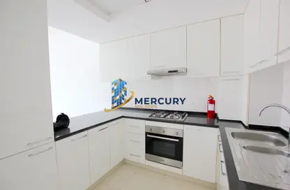Kitchen image for: Apartment - 2 Bedrooms - 2 Bathrooms for rent in Oxford Building - Jumeirah Village Circle - Dubai, Image 1