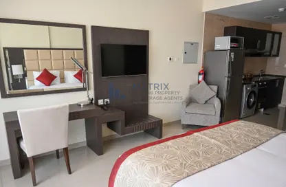 Room / Bedroom image for: Apartment - 1 Bathroom for sale in Siraj Tower - Arjan - Dubai, Image 1
