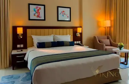 صورة لـ غرفة- غرفة النوم شقة - 1 حمام للايجار في تريبان للاجنحة الفندقية لفخر الدين - مدينة دبي الرياضية - دبي ، صورة رقم 1