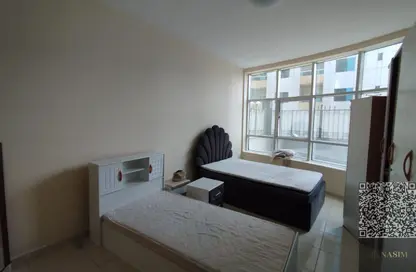 شقة - 2 غرف نوم - 2 حمامات للايجار في أورينت تاور 1 - أورينت تاور - البستان - عجمان