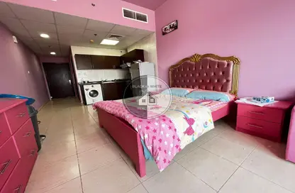 Room / Bedroom image for: Apartment - 1 Bathroom for sale in Union Tower - Al Seer - Ras Al Khaimah, Image 1
