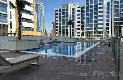 صورة لـ حوض سباحة شقة - غرفة نوم - 1 حمام للايجار في عزيزي ريفيرا - ميدان واحد - ميدان - دبي ، صورة رقم 1