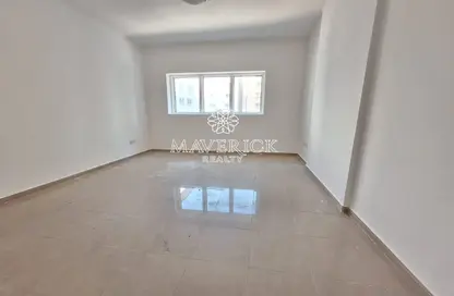 Empty Room image for: Apartment - 1 Bedroom - 2 Bathrooms for rent in Tiger 4 by ASAS - Al Khan - Sharjah, Image 1