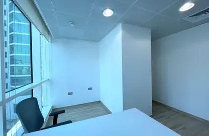 Office Space - Studio - 4 Bathrooms for rent in Hamdan Street - Abu Dhabi