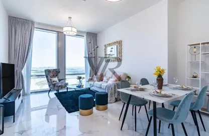 Living / Dining Room image for: Apartment - 2 Bedrooms - 2 Bathrooms for rent in Amna - Al Habtoor City - Business Bay - Dubai, Image 1