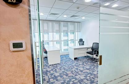 Office Space - Studio - 4 Bathrooms for rent in Hamdan Street - Abu Dhabi