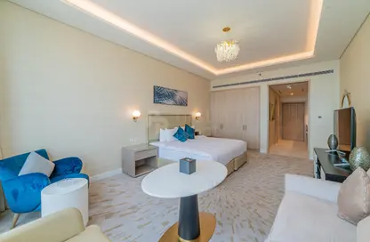 صورة لـ غرفة المعيشة شقة - 1 حمام للايجار في برج النخيل - نخلة جميرا - دبي ، صورة رقم 1
