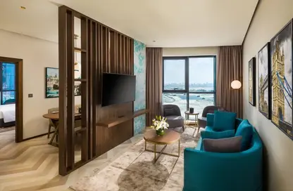 صورة لـ غرفة المعيشة النزل و الشقق الفندقية - غرفة نوم - 2 حمامات للايجار في فندق ميلينيوم بلايس البرشاء - برشا هايتس (تيكوم) - دبي ، صورة رقم 1