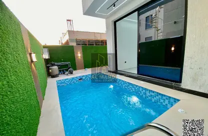 Villa - 5 Bedrooms - 7 Bathrooms for sale in Al Zaheya Gardens - Al Zahya - Ajman