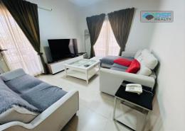 Living Room image for: Apartment - 1 bedroom - 2 bathrooms for rent in Golf Apartments - Al Hamra Village - Ras Al Khaimah, Image 1