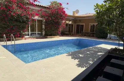 Villa - 4 Bedrooms - 6 Bathrooms for sale in Bungalow Area - Green Community Motor City - Motor City - Dubai