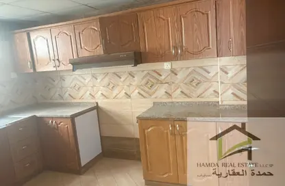 شقة - غرفة نوم - 2 حمامات للايجار في مجمع مويلح - تجارية مويلح - الشارقة