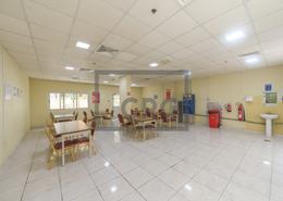 صورةغرفة المعيشة / غرفة الطعام لـ: سكن عمال - 1 حمام للبيع في المرحلة 2 - مجمع دبي للإستثمار - دبي, صورة 1