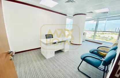 Living Room image for: Office Space - Studio - 2 Bathrooms for rent in Naser Al Junaibi Building - Muroor Area - Abu Dhabi, Image 1