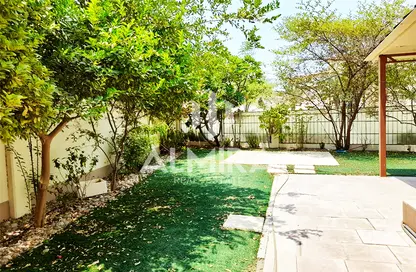 Garden image for: Villa - 5 Bedrooms - 6 Bathrooms for sale in Al Tharwaniyah Community - Al Raha Gardens - Abu Dhabi, Image 1