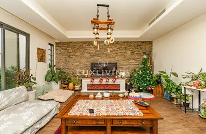 Living Room image for: Villa - 5 Bedrooms - 5 Bathrooms for sale in Aurum Villas - Aster - Damac Hills 2 - Dubai, Image 1