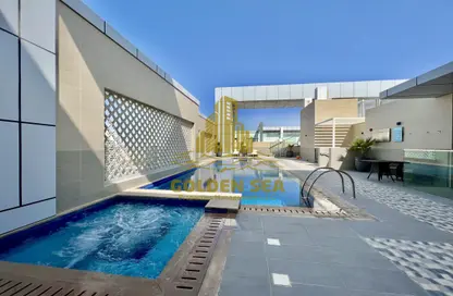 صورة لـ حوض سباحة شقة - 2 غرف نوم - 3 حمامات للايجار في برج الريان - دانة بو ظبي - أبوظبي ، صورة رقم 1