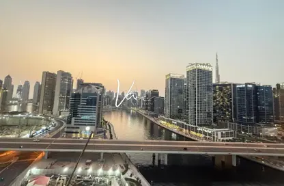 شقة - 2 غرف نوم - 3 حمامات للايجار في خليج القناة - الخليج التجاري - دبي