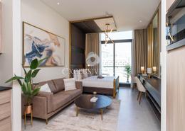 صورةغرفة المعيشة لـ: Studio - 1 حمام للكراء في احياء سيجنيتشر السكنية - قرية الجميرا سركل - دبي, صورة 1