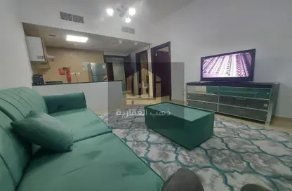 Living Room image for: Apartment - 1 Bedroom - 2 Bathrooms for sale in City Tower - Al Nuaimiya - Ajman, Image 1