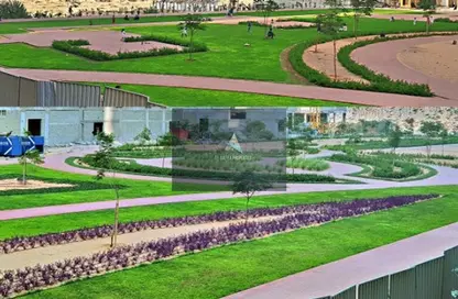 صورة لـ حديقة شقة - 3 غرف نوم - 3 حمامات للايجار في برج بارادايس ليك ب9 - ابراج بحيرة بارادايس - مدينة الإمارات - عجمان ، صورة رقم 1