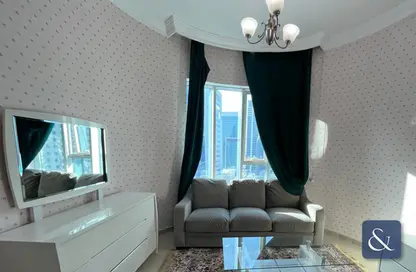 صورة لـ غرفة المعيشة شقة - 1 حمام للايجار في برج أونتاريو - الخليج التجاري - دبي ، صورة رقم 1