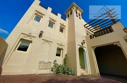 Outdoor Building image for: Townhouse - 3 Bedrooms - 3 Bathrooms for sale in The Townhouses at Al Hamra Village - Al Hamra Village - Ras Al Khaimah, Image 1