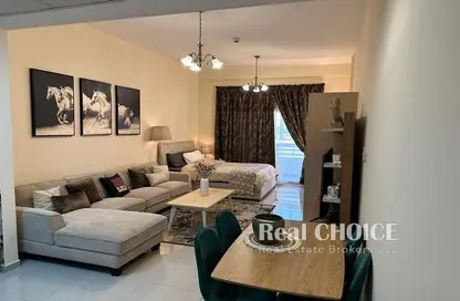Living / Dining Room image for: Apartment - 1 Bathroom for sale in Madison Residences - Majan - Dubai, Image 1