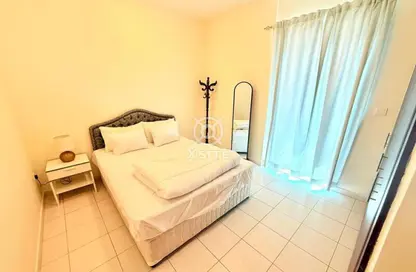 شقة - غرفة نوم - 2 حمامات للايجار في برج الكريكت - مدينة دبي الرياضية - دبي