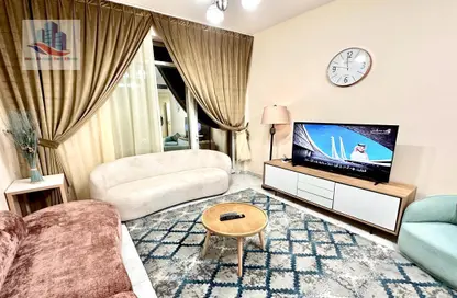 Living Room image for: Apartment - 1 Bedroom - 1 Bathroom for rent in Al Qasba - Sharjah, Image 1