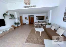 Living / Dining Room image for: Apartment - 1 bedroom - 2 bathrooms for rent in Al Khushkar - Shoreline Apartments - Palm Jumeirah - Dubai, Image 1