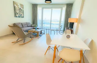 Living / Dining Room image for: Apartment - 1 Bedroom - 2 Bathrooms for sale in 1 Residences - 2 - Wasl1 - Al Kifaf - Dubai, Image 1