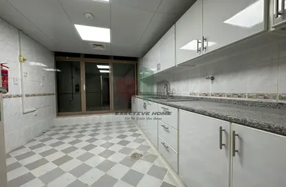 Kitchen image for: Apartment - 3 Bedrooms - 3 Bathrooms for rent in Hassan Ibrahim Al Fardan - Airport Road - Abu Dhabi, Image 1