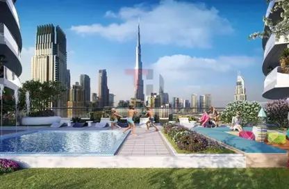 Pool image for: Apartment - 2 Bedrooms - 3 Bathrooms for sale in Imperial Avenue - Downtown Dubai - Dubai, Image 1