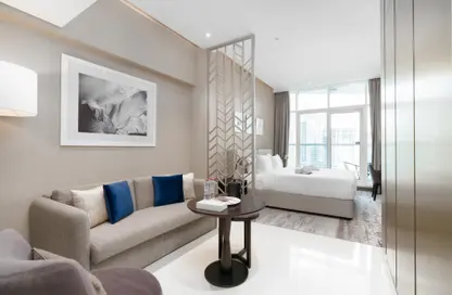 صورة لـ غرفة المعيشة شقة - 1 حمام للايجار في بريفه باي داماك (ايه) - داماك مايسون برايف - الخليج التجاري - دبي ، صورة رقم 1