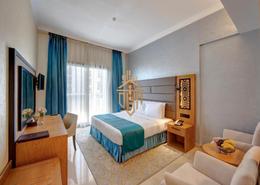 Room / Bedroom image for: Studio - 1 bathroom for rent in Class Hotel Apartments - Barsha Heights (Tecom) - Dubai, Image 1