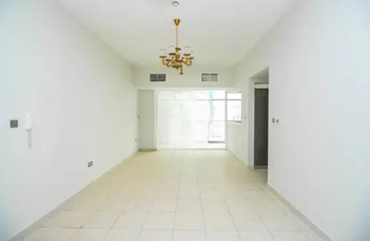 Empty Room image for: Apartment - 2 Bedrooms - 2 Bathrooms for sale in Glitz 3 - Glitz - Dubai Studio City - Dubai, Image 1